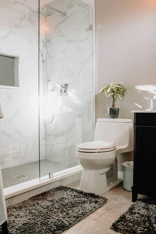 Realistic editorial lifestyle scene showing manual vs power grout brush in active household use, practical uncluttered s